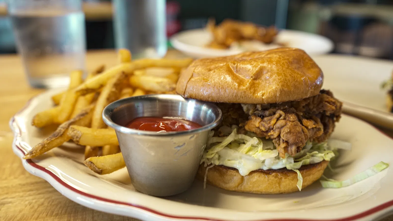 a burger and fries on a plate