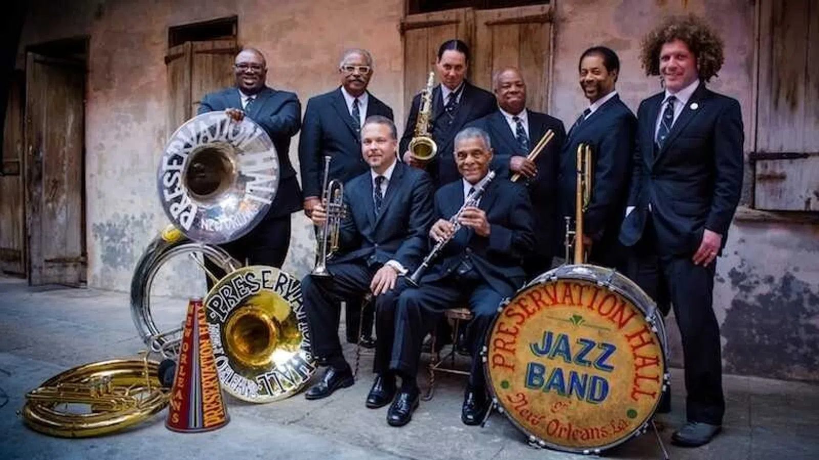 a group of men holding instruments