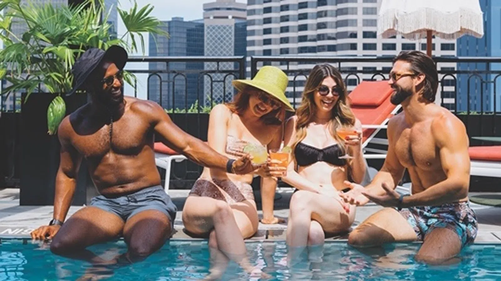 a group of people sitting in a pool