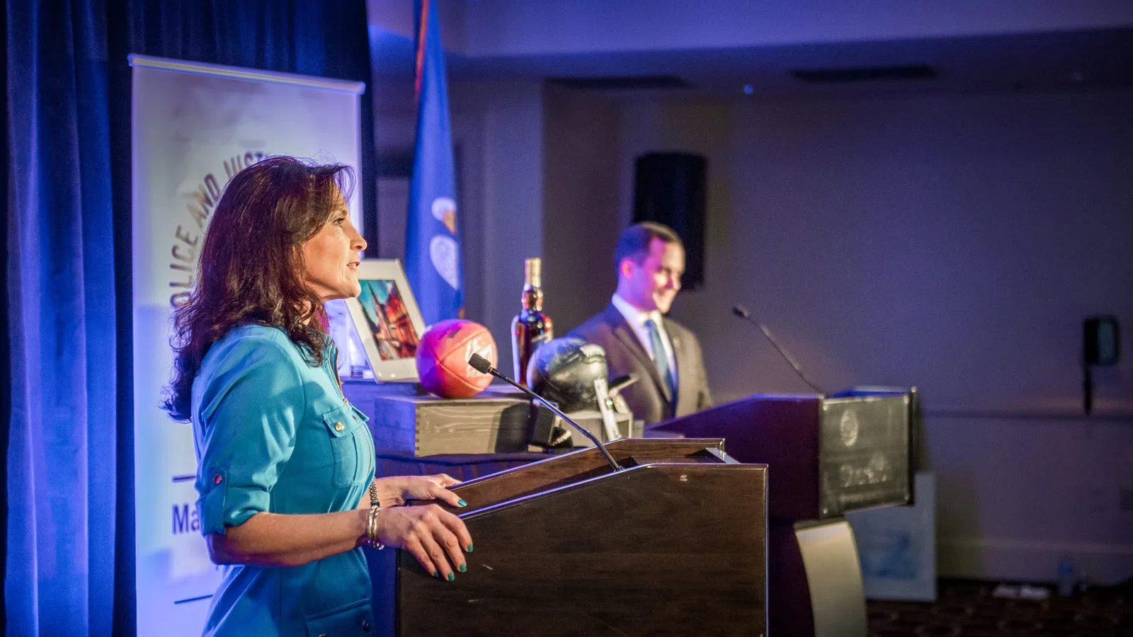 a person standing at a podium