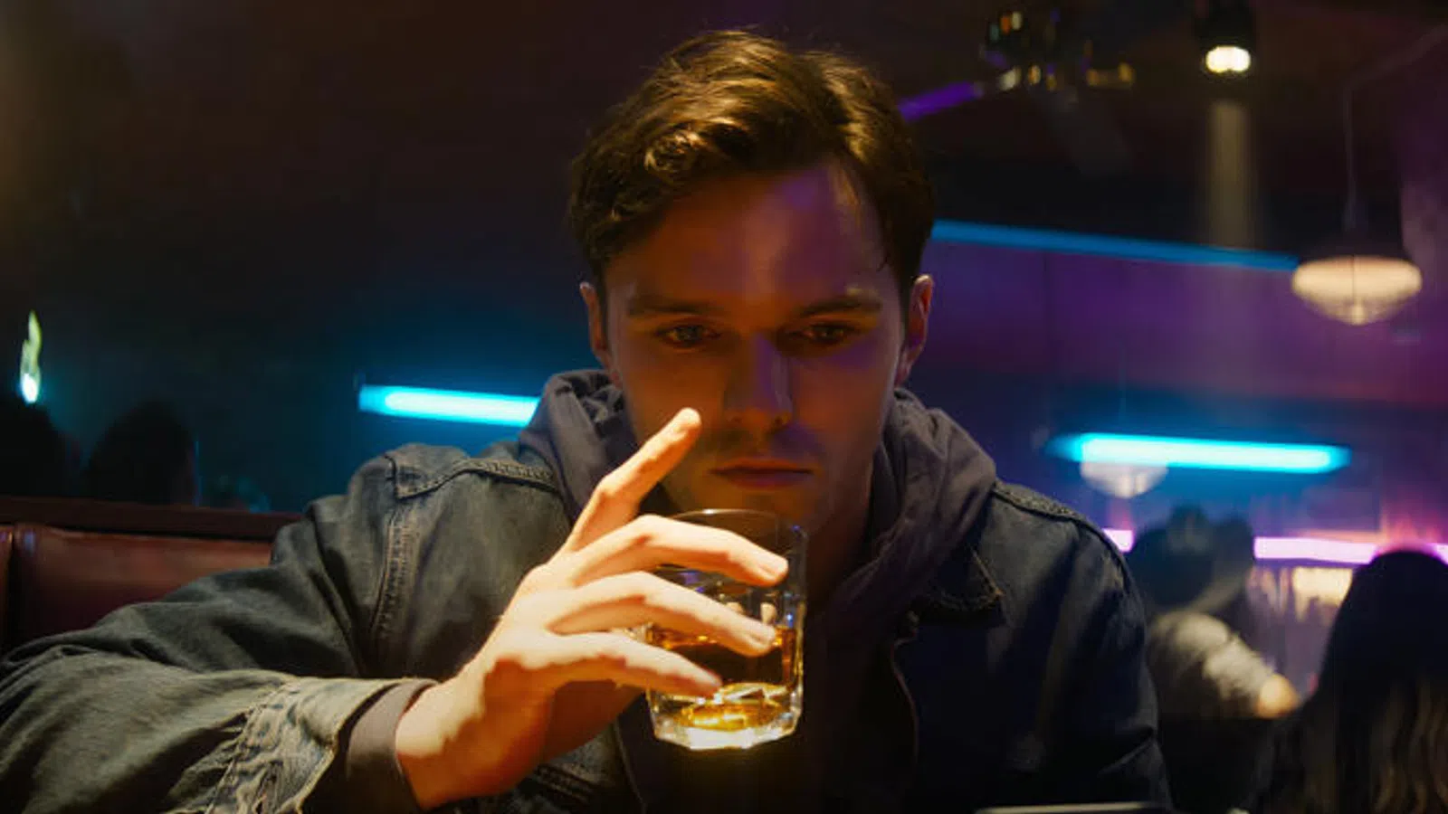 a man holding a glass