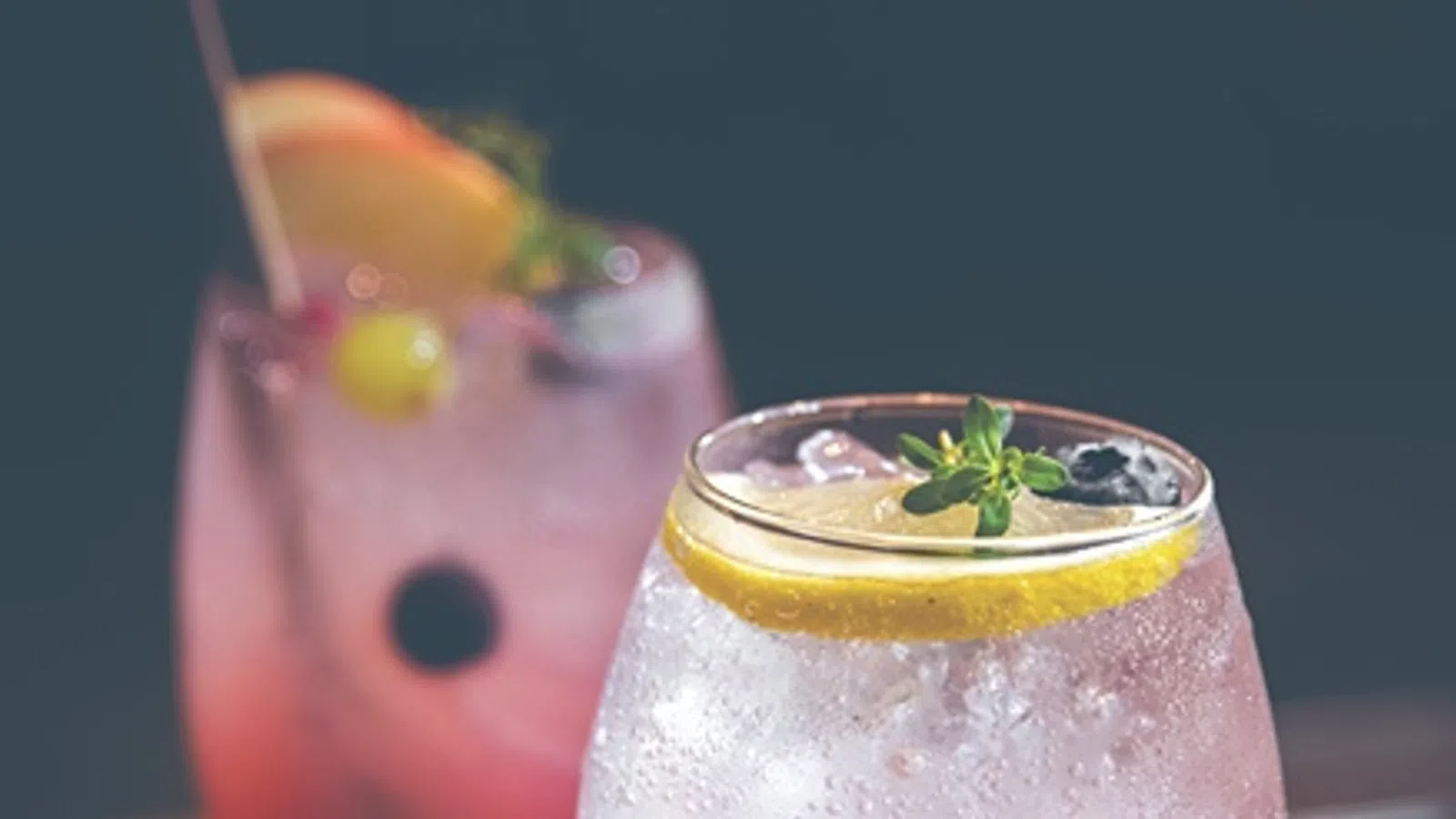two drinks with straws