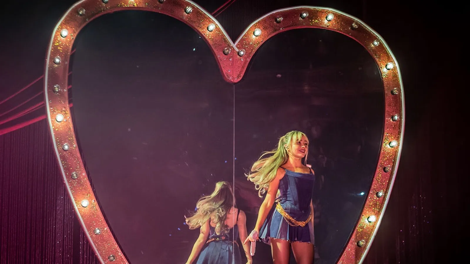two women on a stage