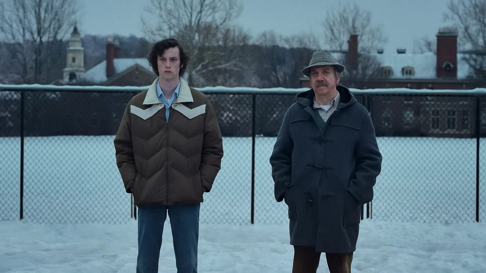two men standing in the snow