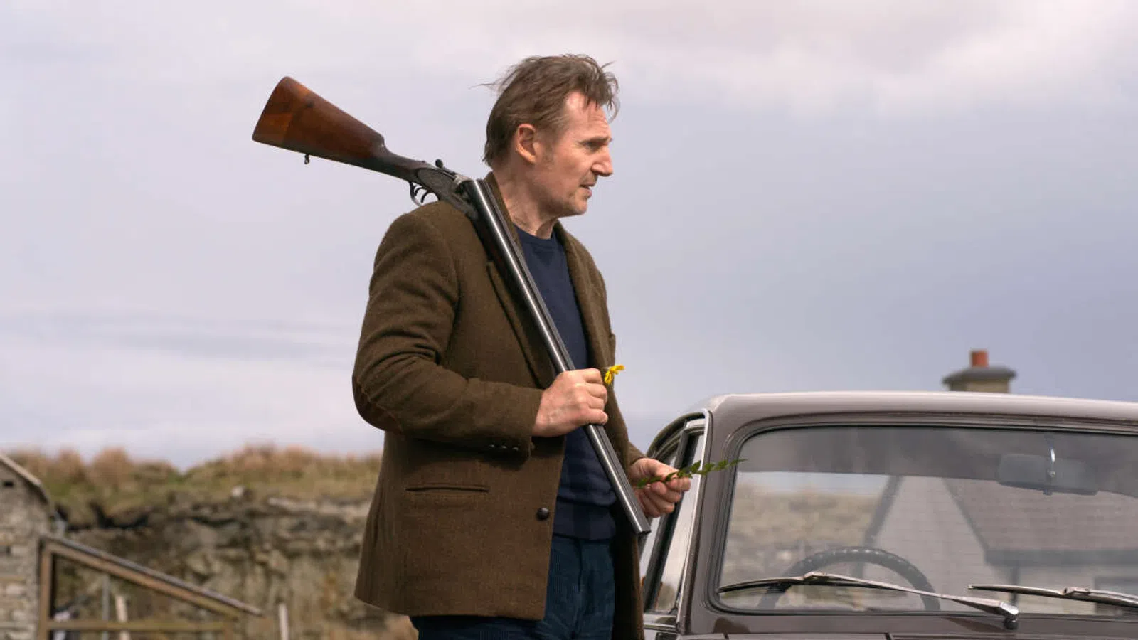 a man holding a gun