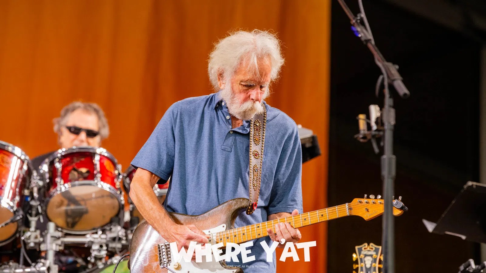 a person playing a guitar