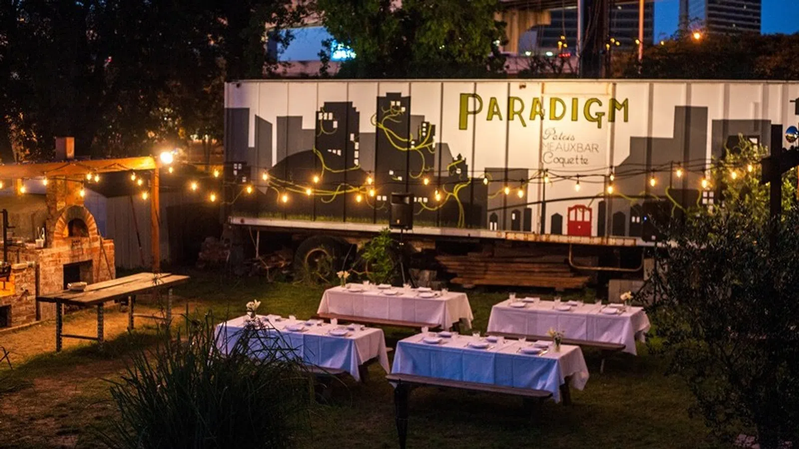 a group of tables and chairs outside