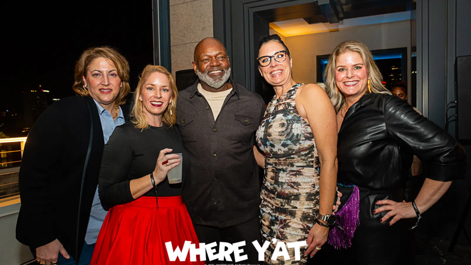 Emmitt Smith et al. posing for a photo
