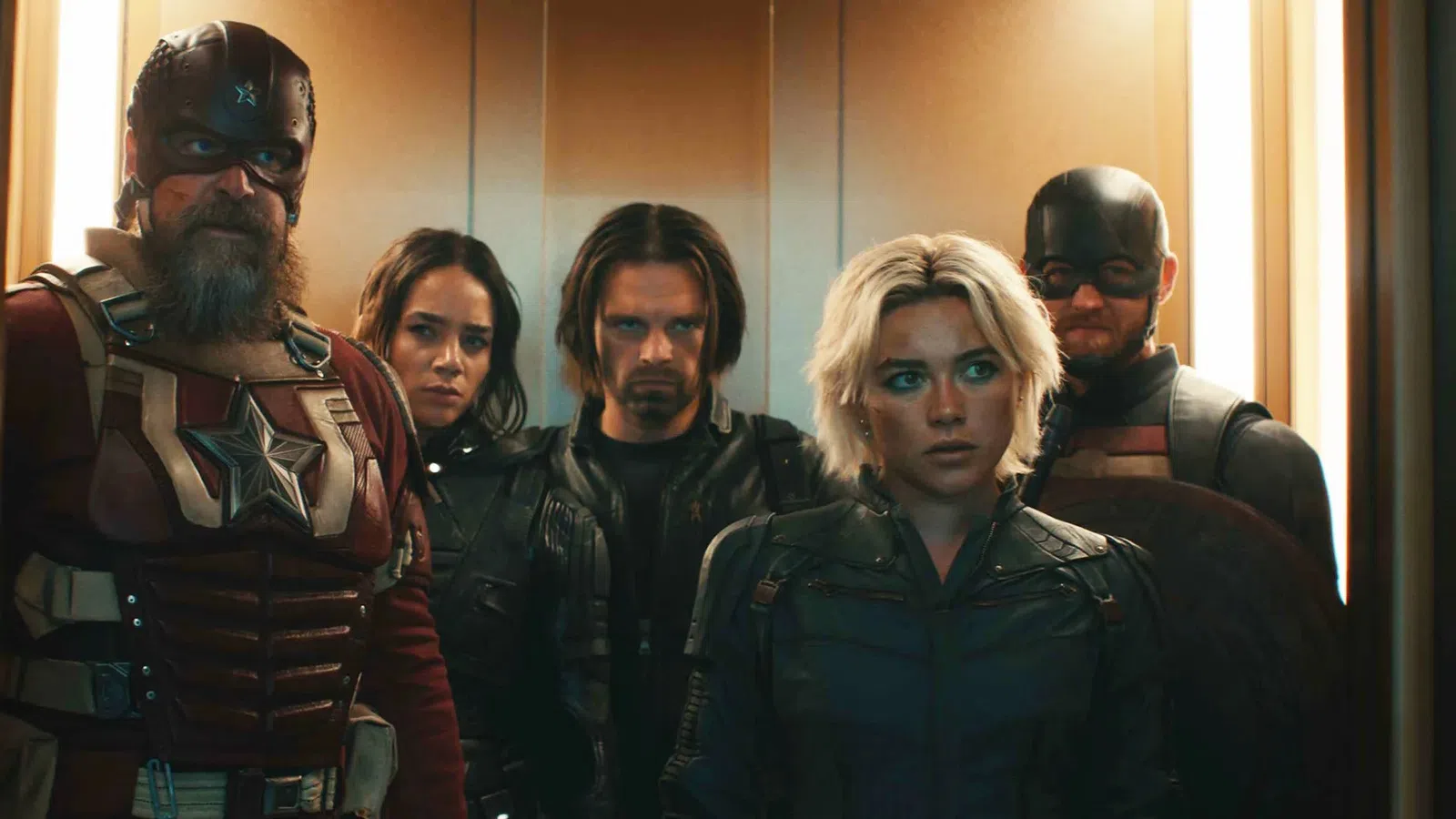 Five Marvel superheroes including Captain America and Black Widow in an intense elevator scene.