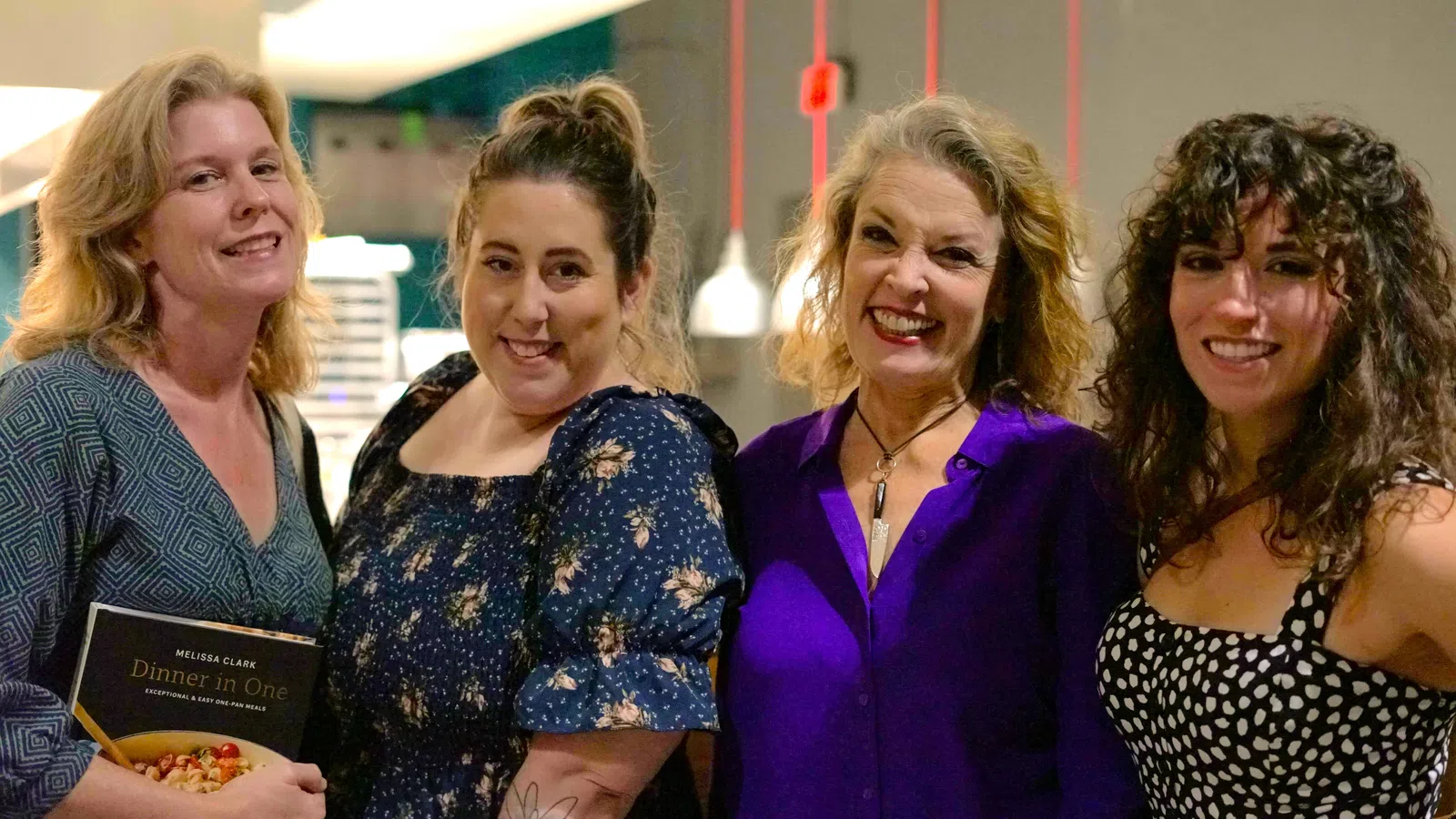 a group of women smiling