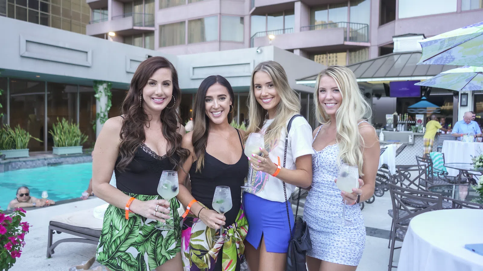 a group of women posing for a photo
