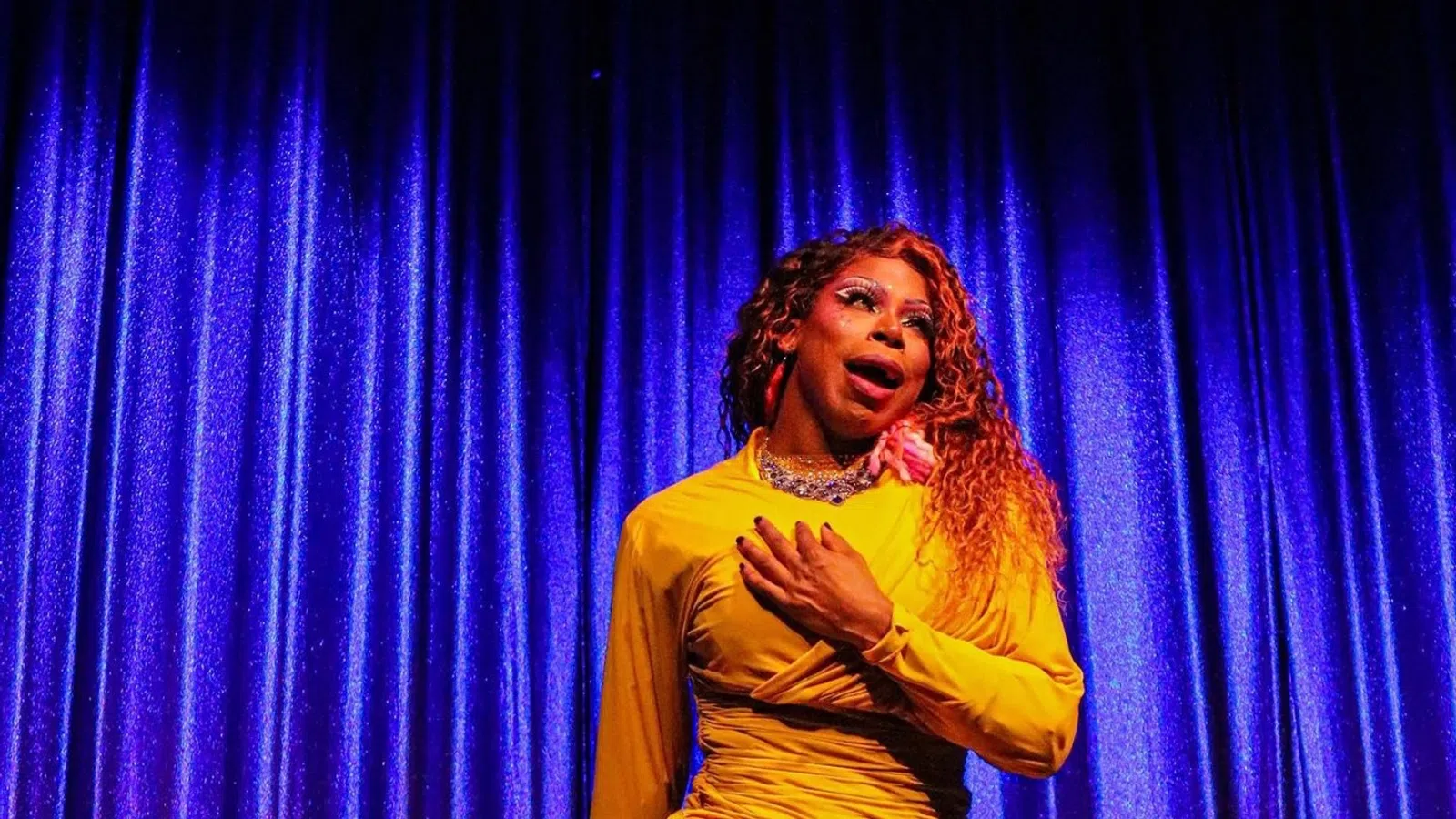a woman in a yellow dress