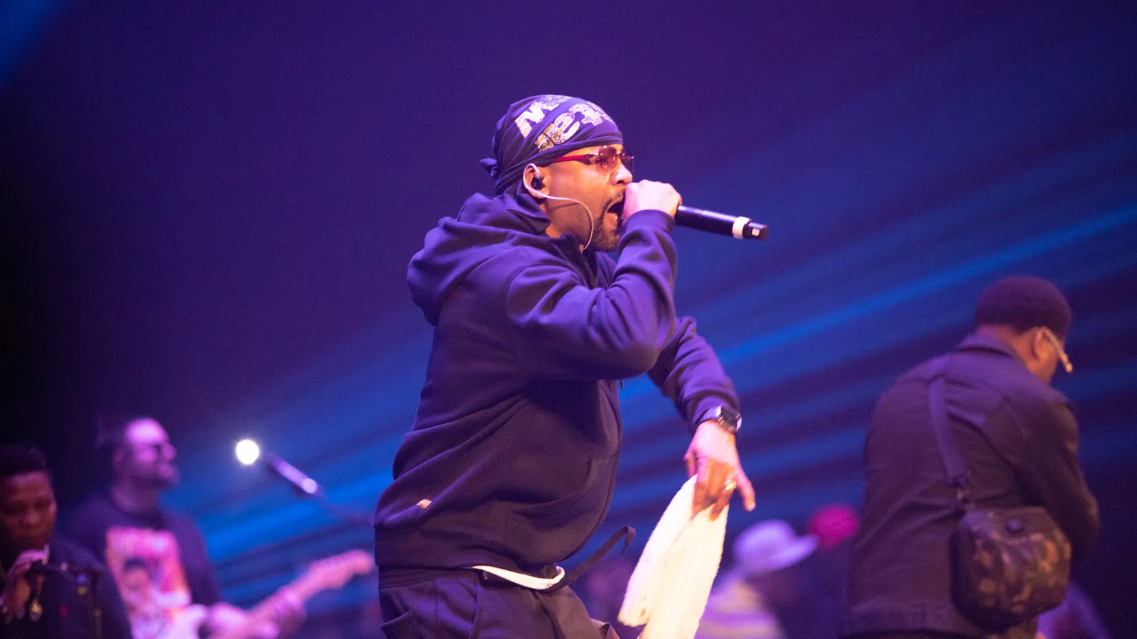 a man singing into a microphone