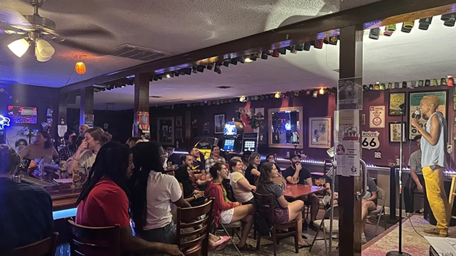 a group of people sitting at a bar