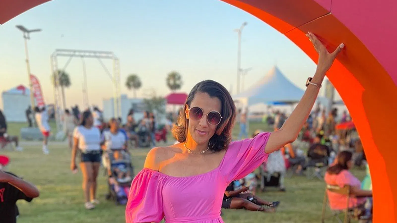 a man in a pink dress
