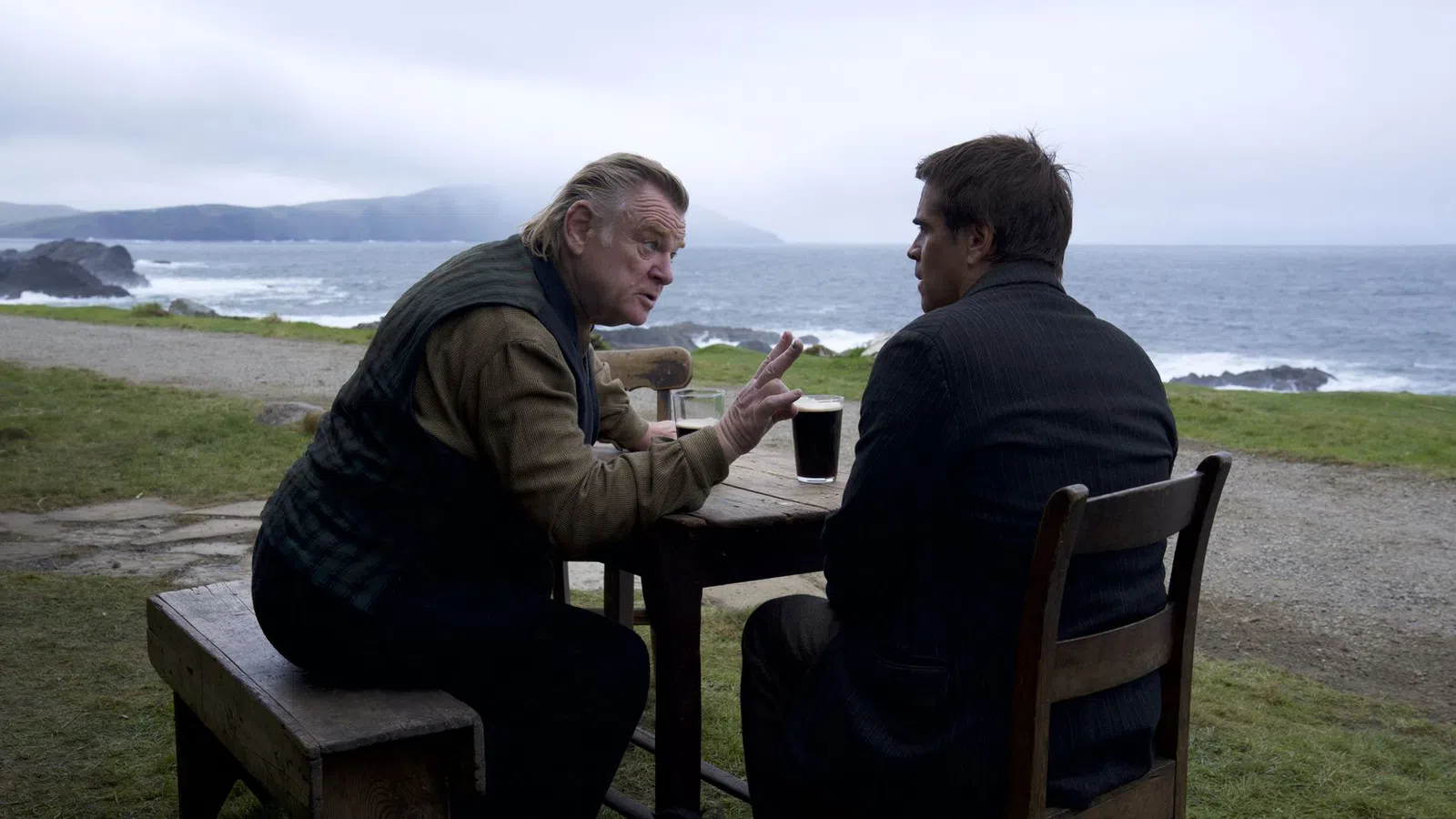 two men sitting at a table