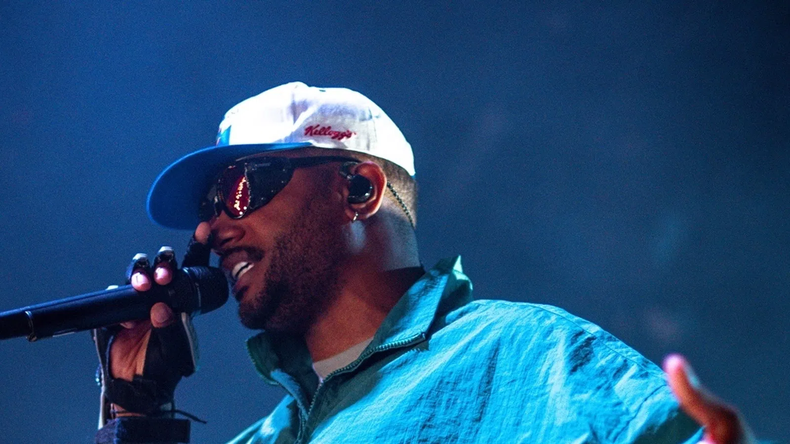 a man singing into a microphone