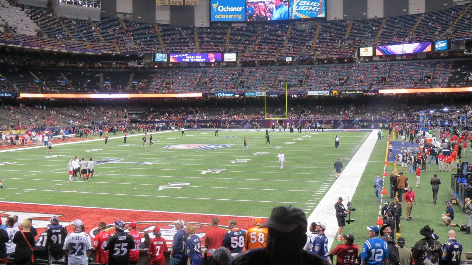 a football stadium with a crowd watching