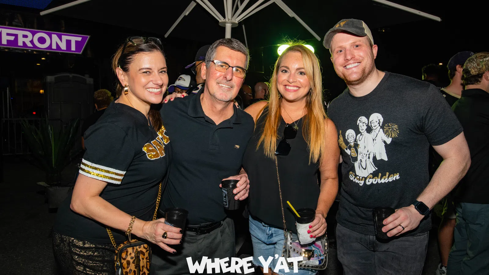 a group of people posing for a photo