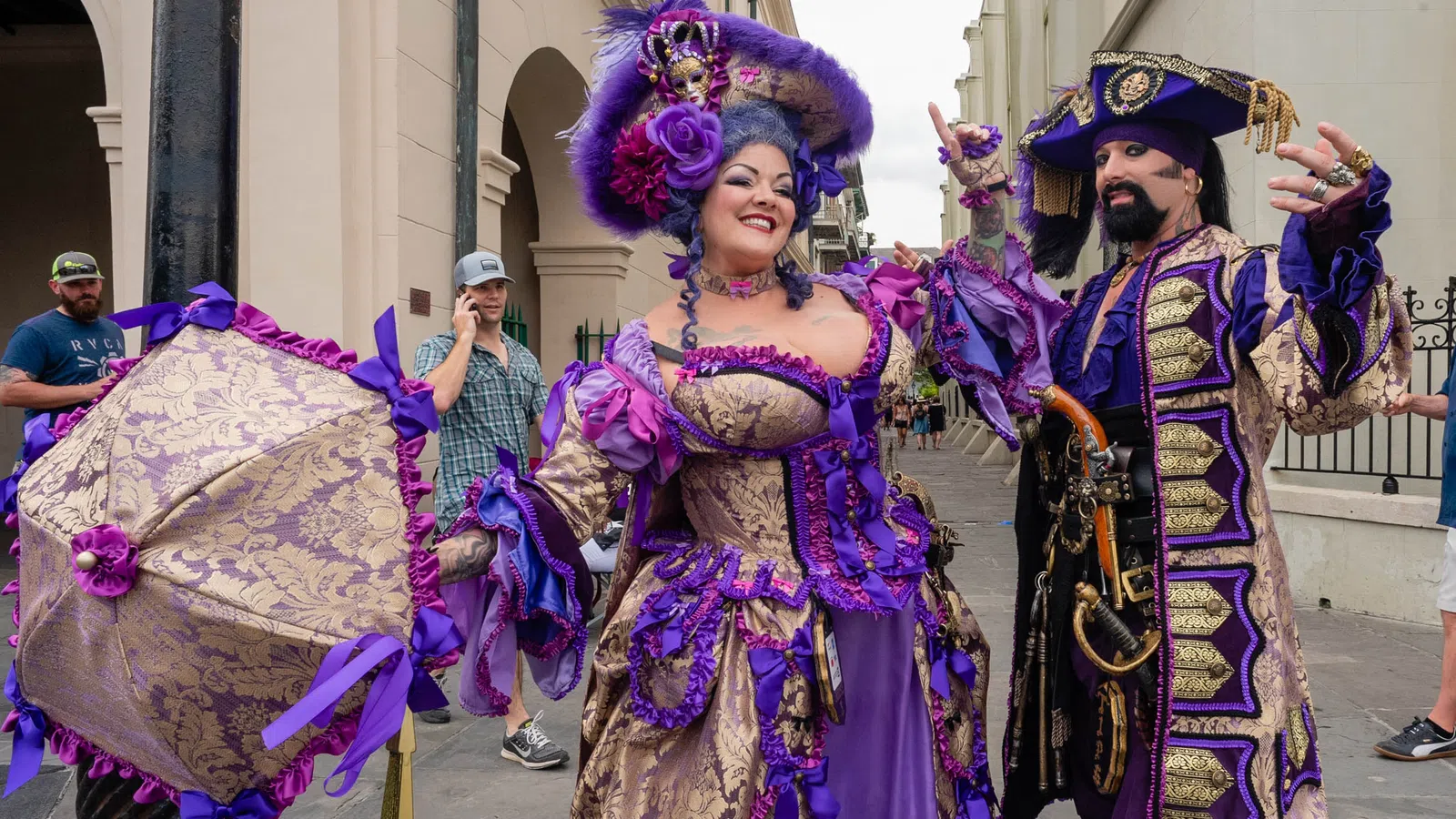 a man and woman dressed up in clothing