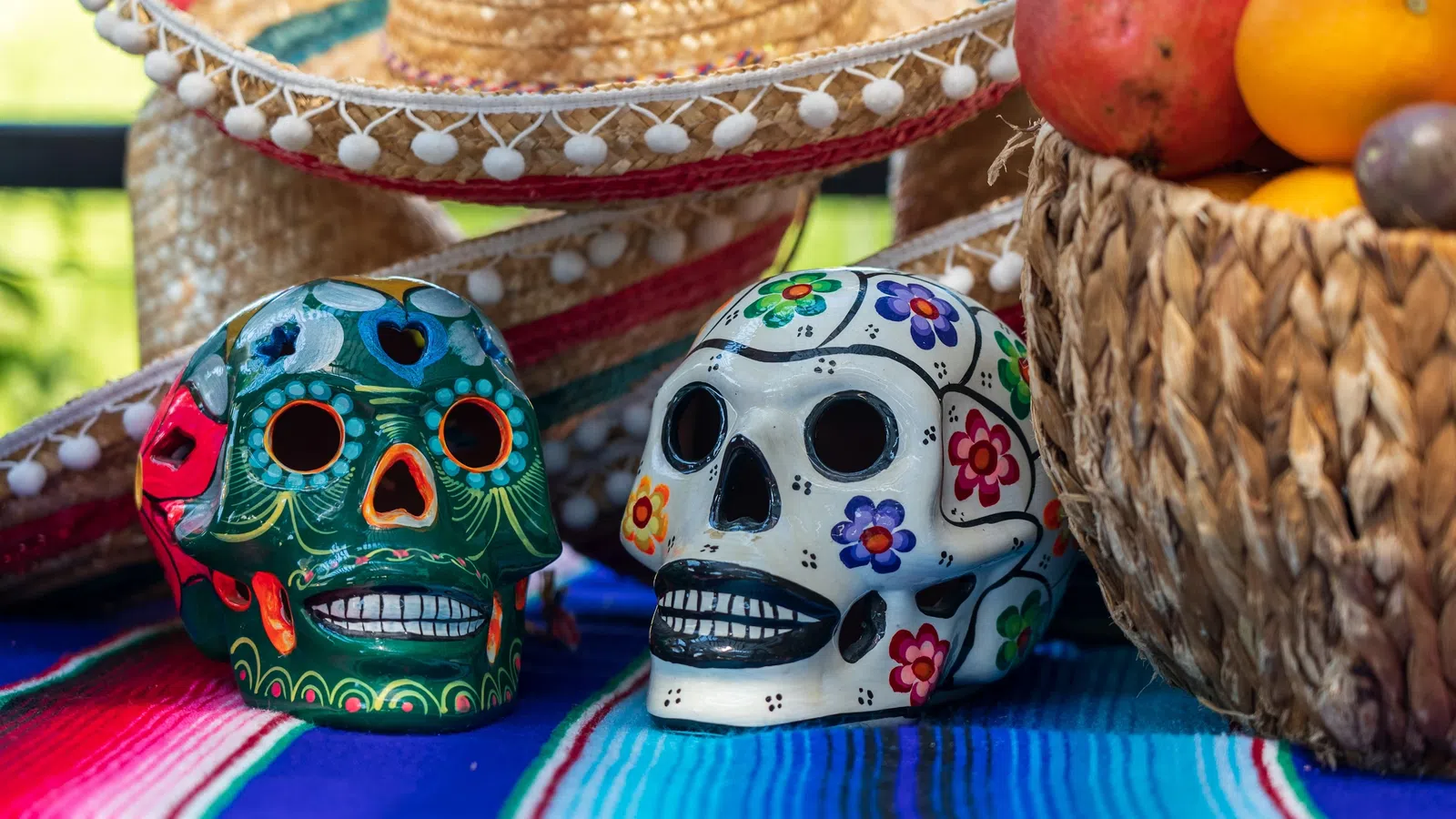 a basket with eggs and a basket with a face and a basket with fruit
