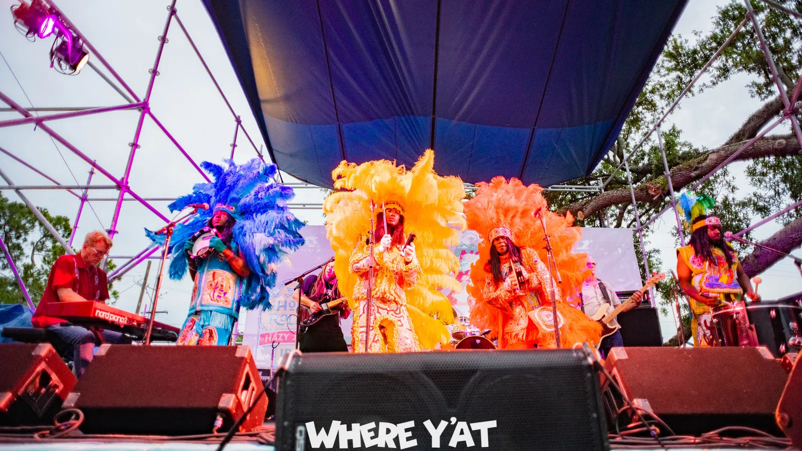 a group of people performing on stage