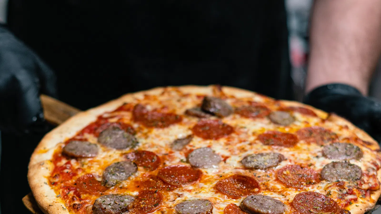 Five Places to Celebrate National Sausage Pizza Day on October 11