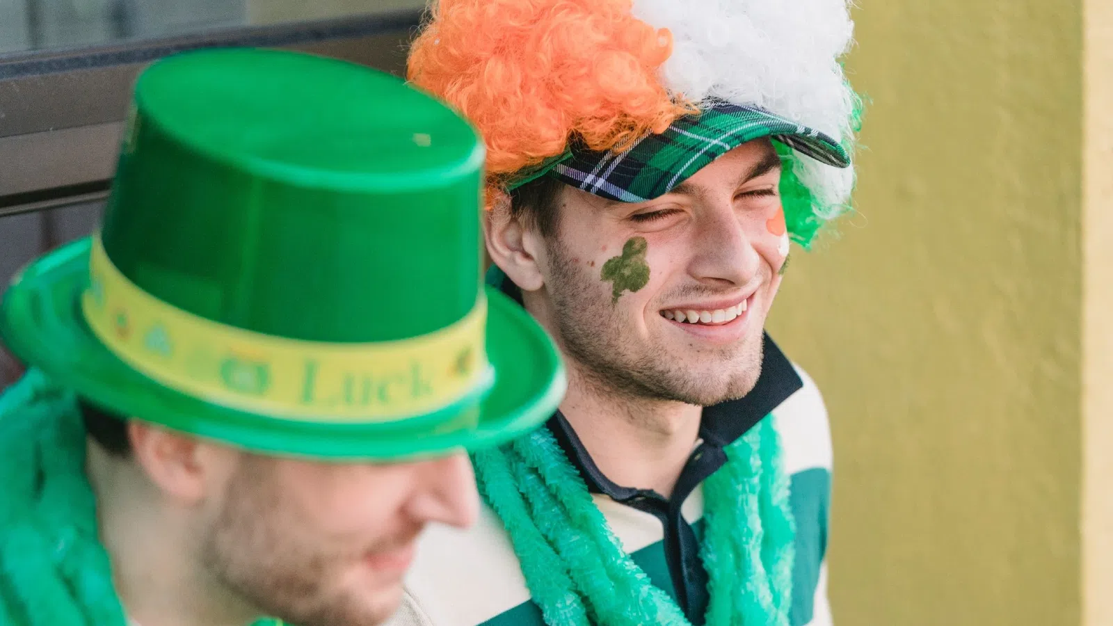 a couple of men wearing hats