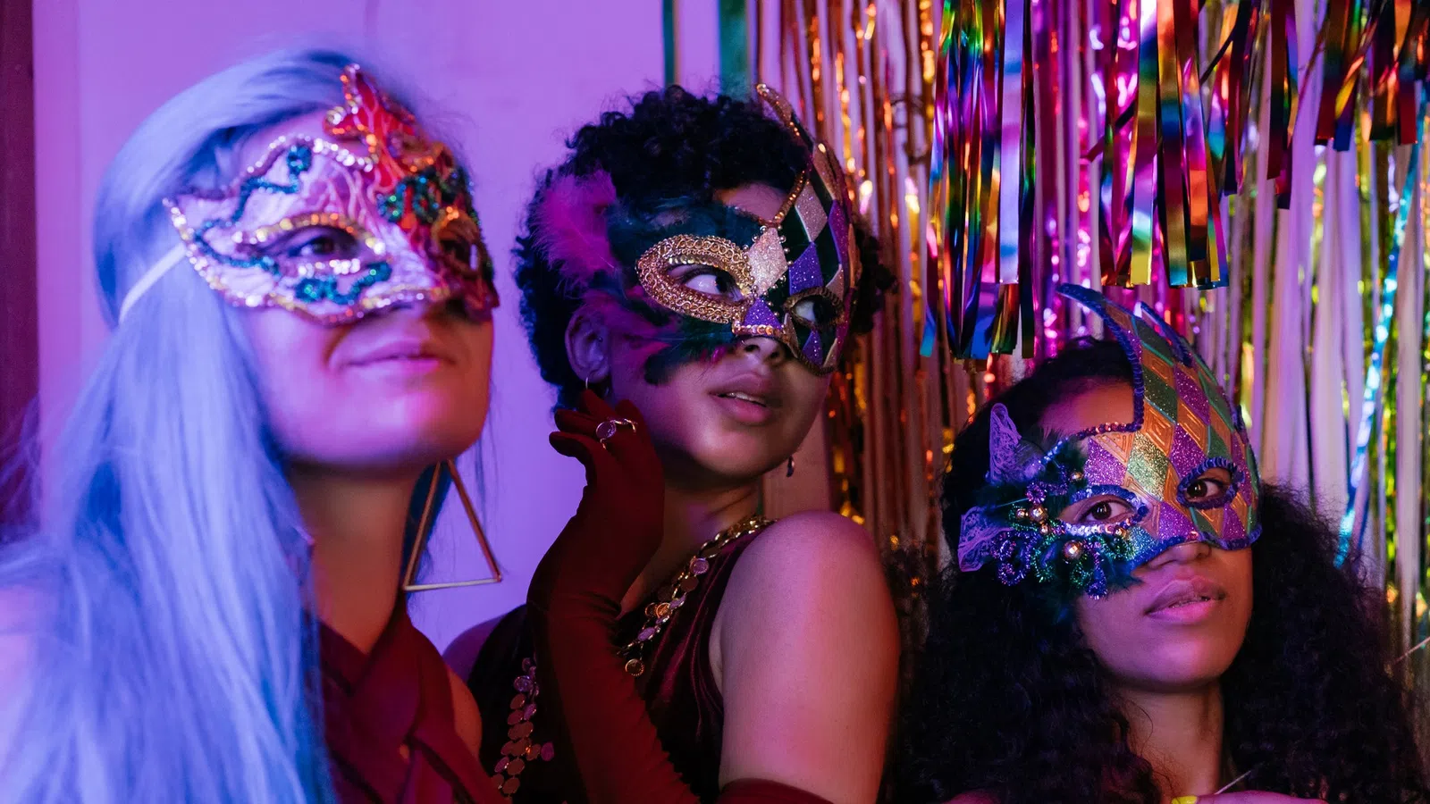 a group of people wearing masks