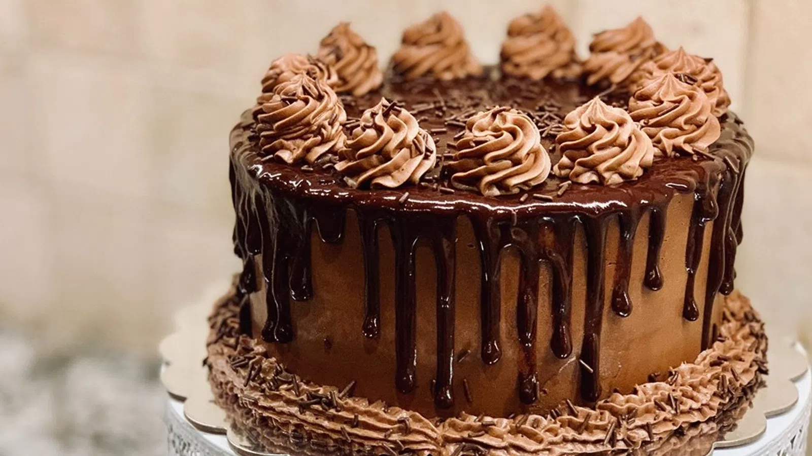 a chocolate cake with chocolate frosting