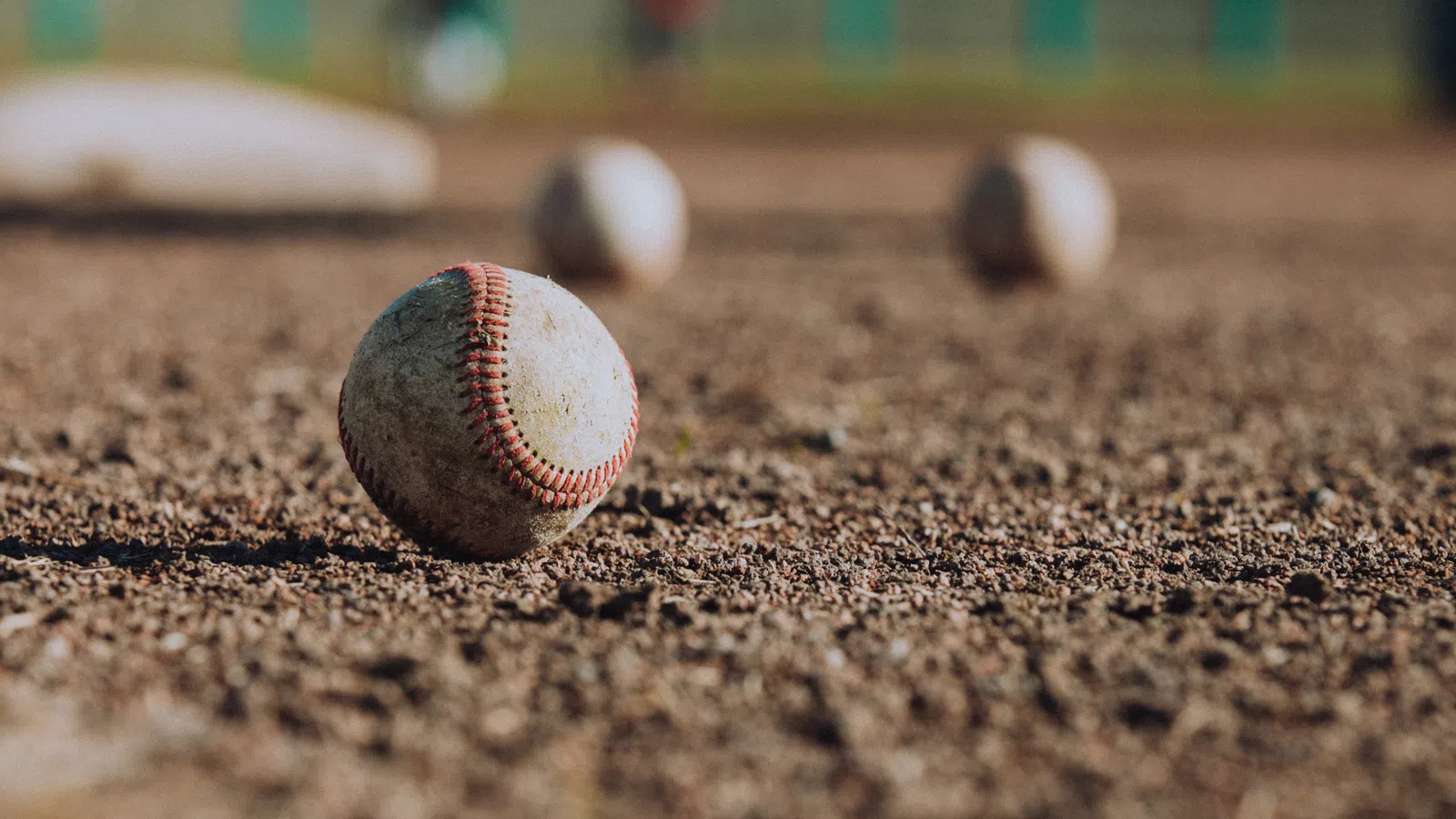 a red and white ball on the ground
