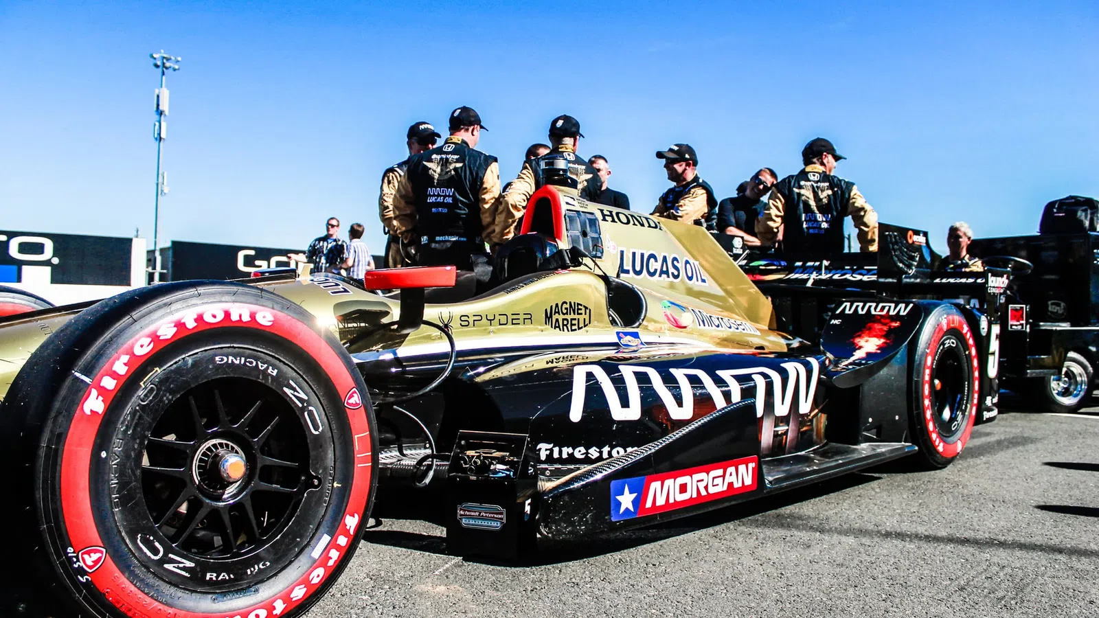 a group of people in a race car