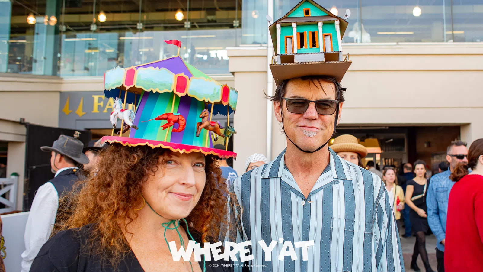 a man and woman wearing hats