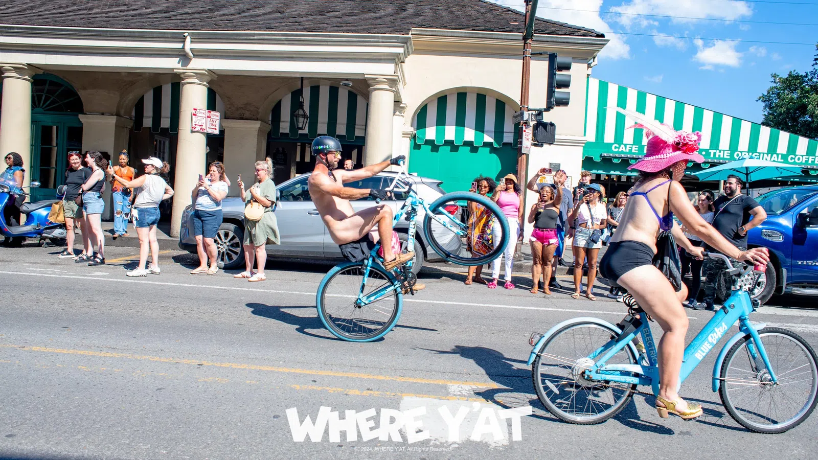 a group of people riding bikes