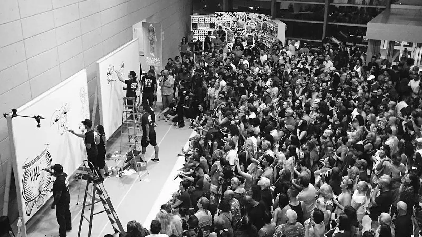 a large crowd of people in a room