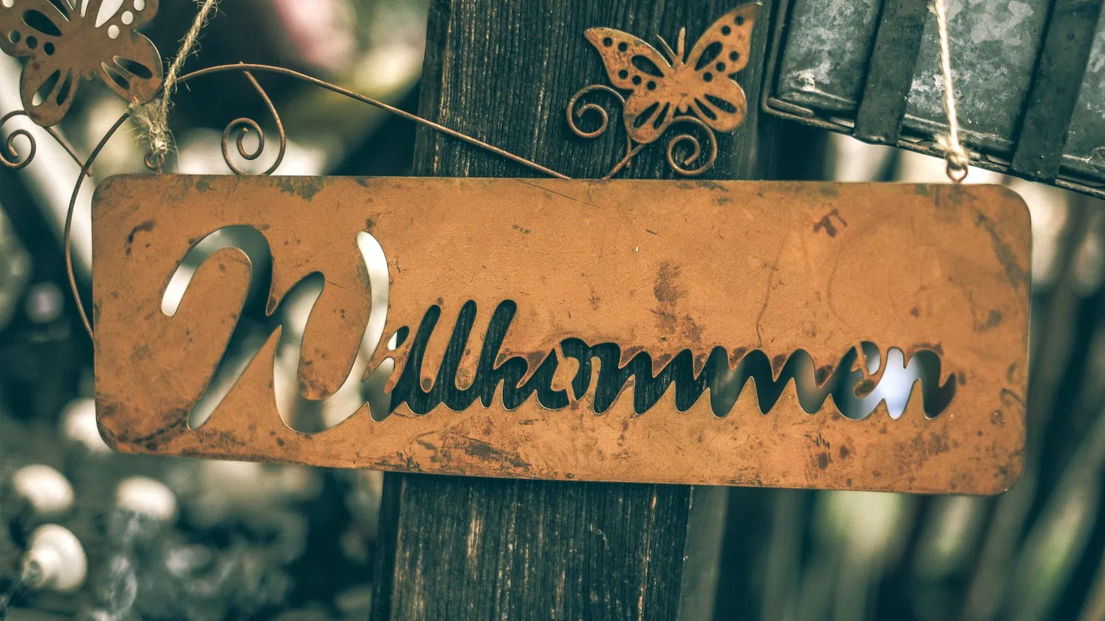 a sign on a fence