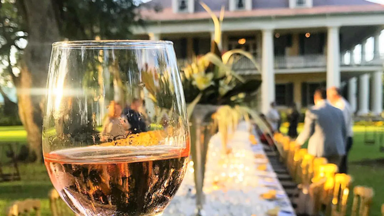 a glass of wine on a table