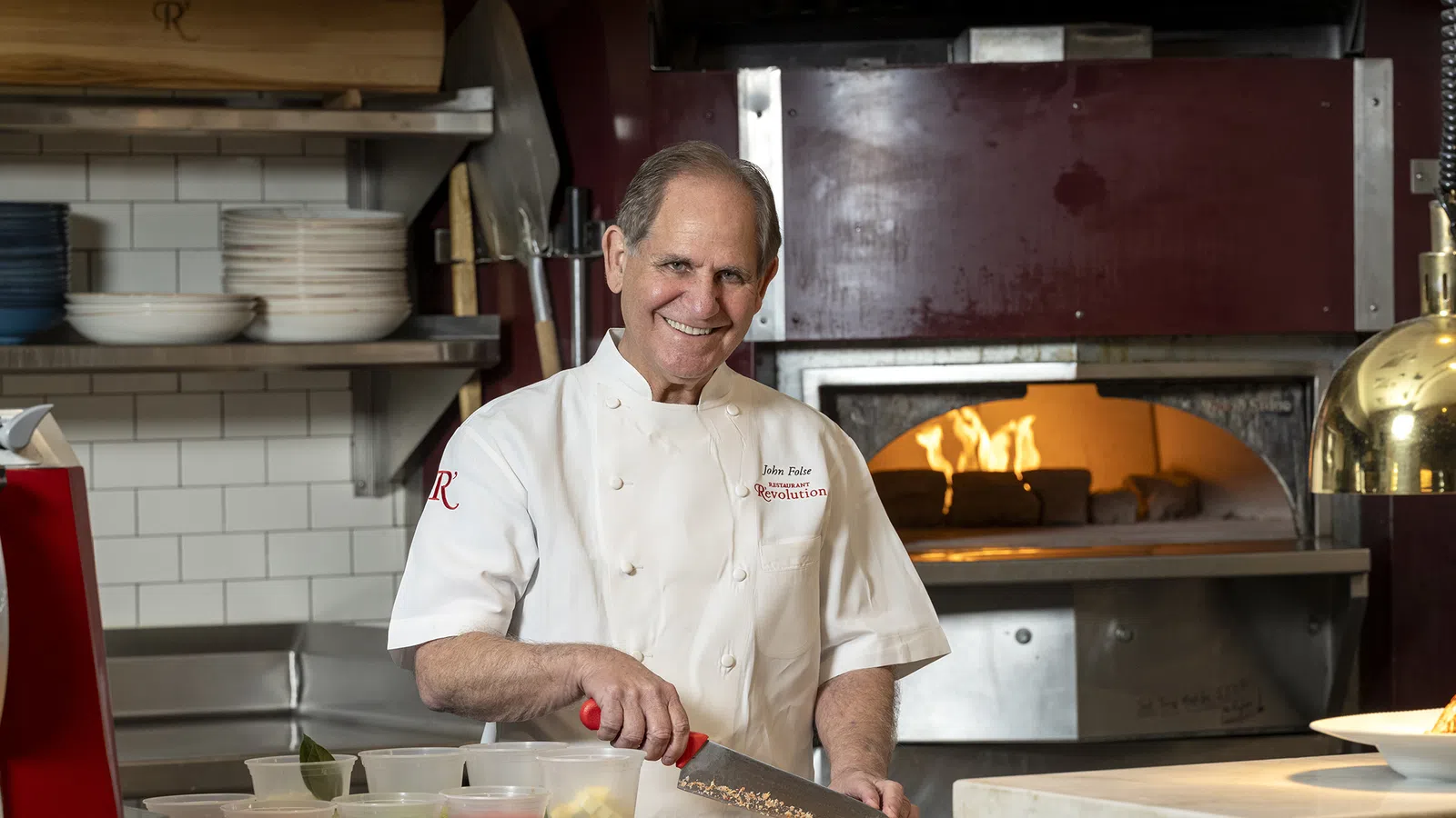 John Folse in a kitchen