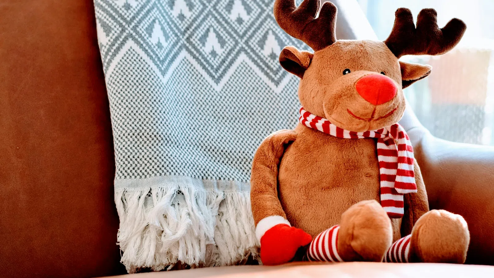 a stuffed animal on a couch