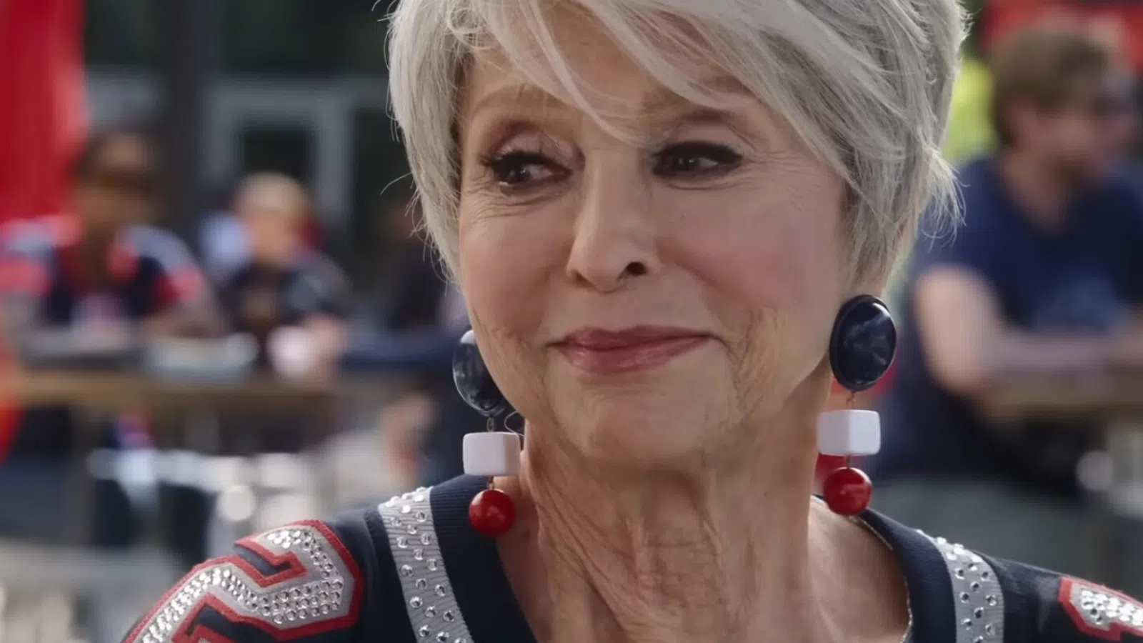 Rita Moreno with a microphone