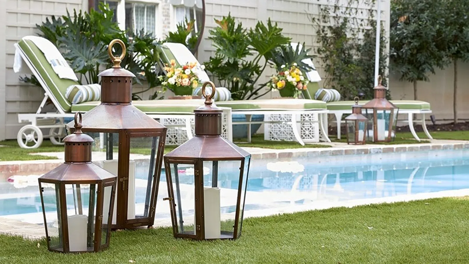 a pool with a table and chairs