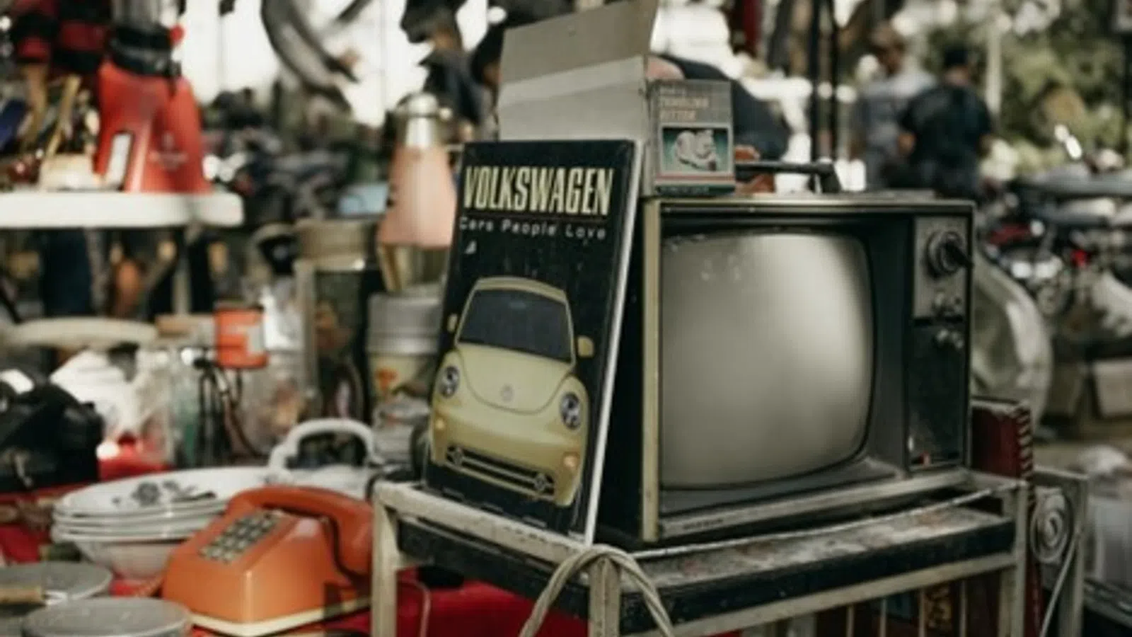 old televisions on a table