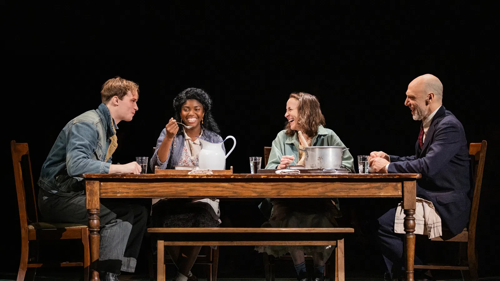 a group of people sitting at a table