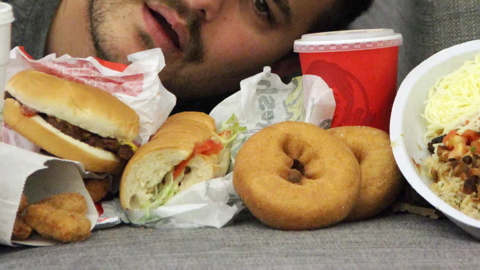 a person eating a sandwich