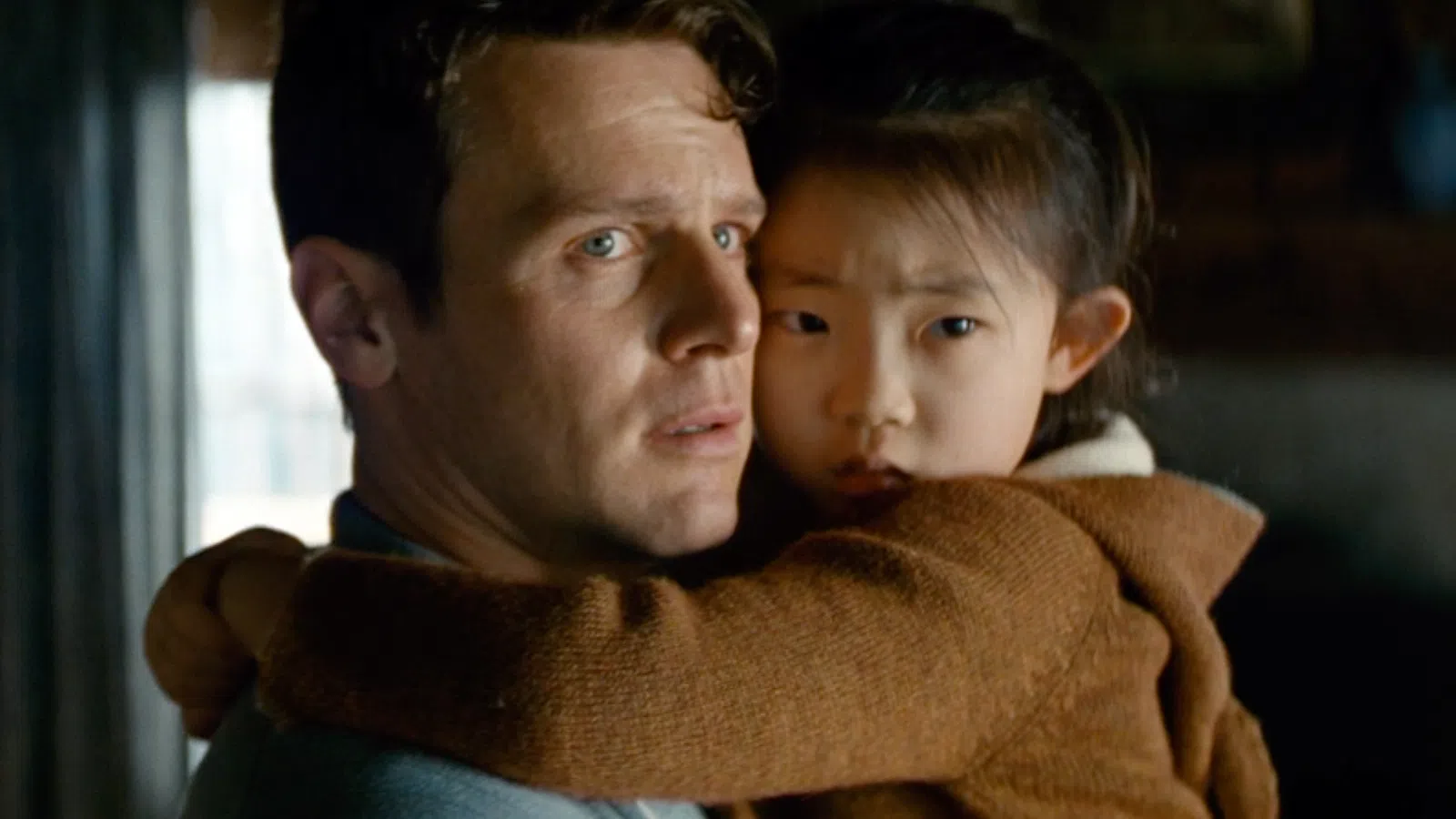 a person holding a baby