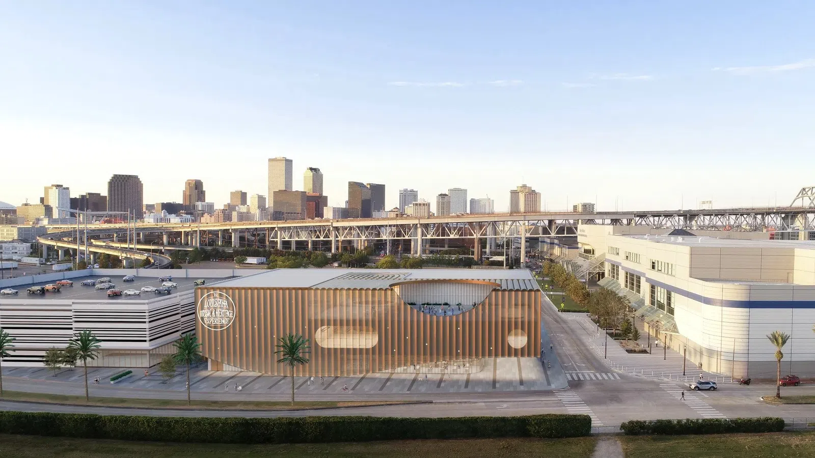 Modern urban building with wooden accents in front of a city skyline and elevated bridge under clear sky.