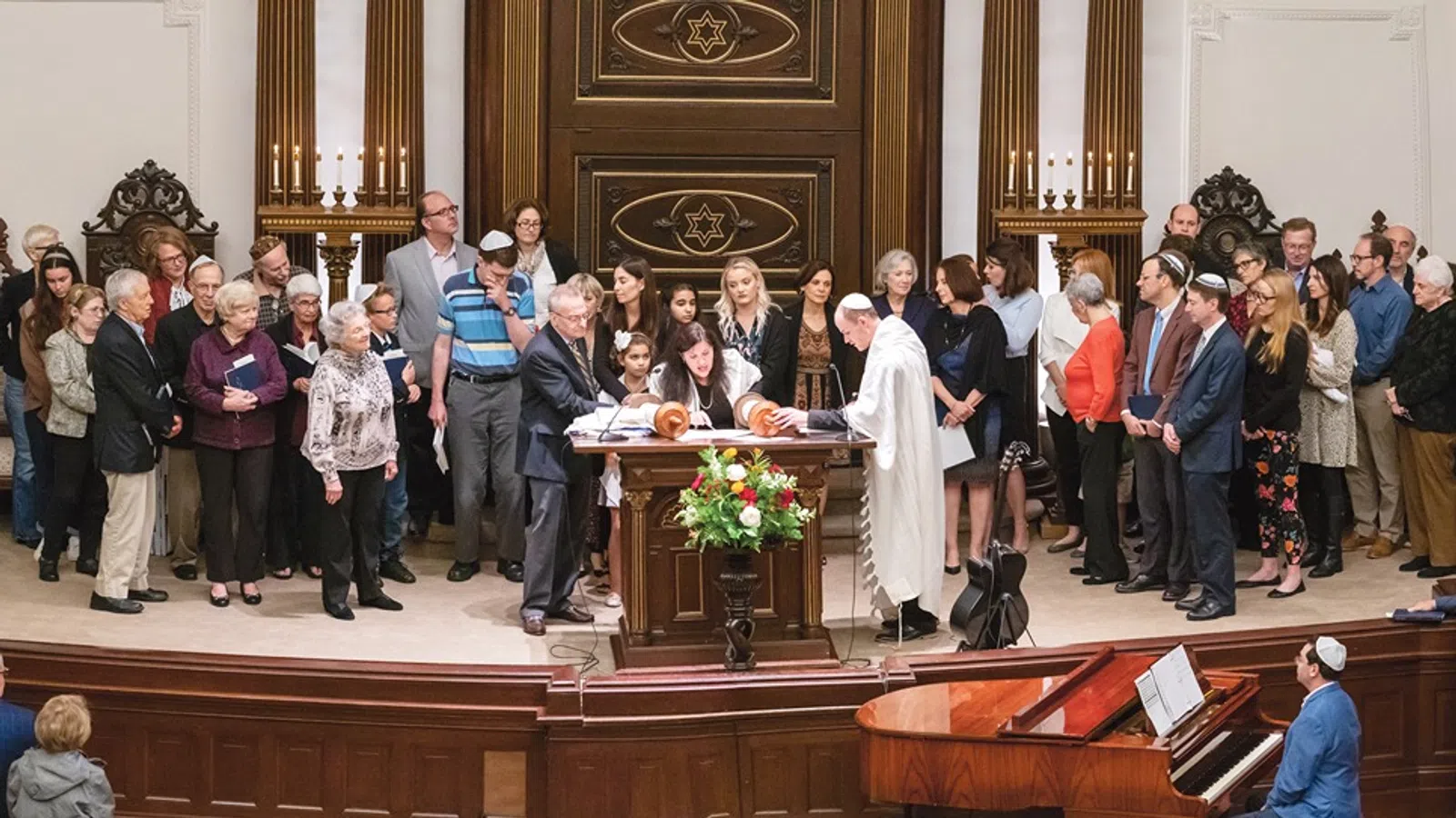 a group of people standing in a room