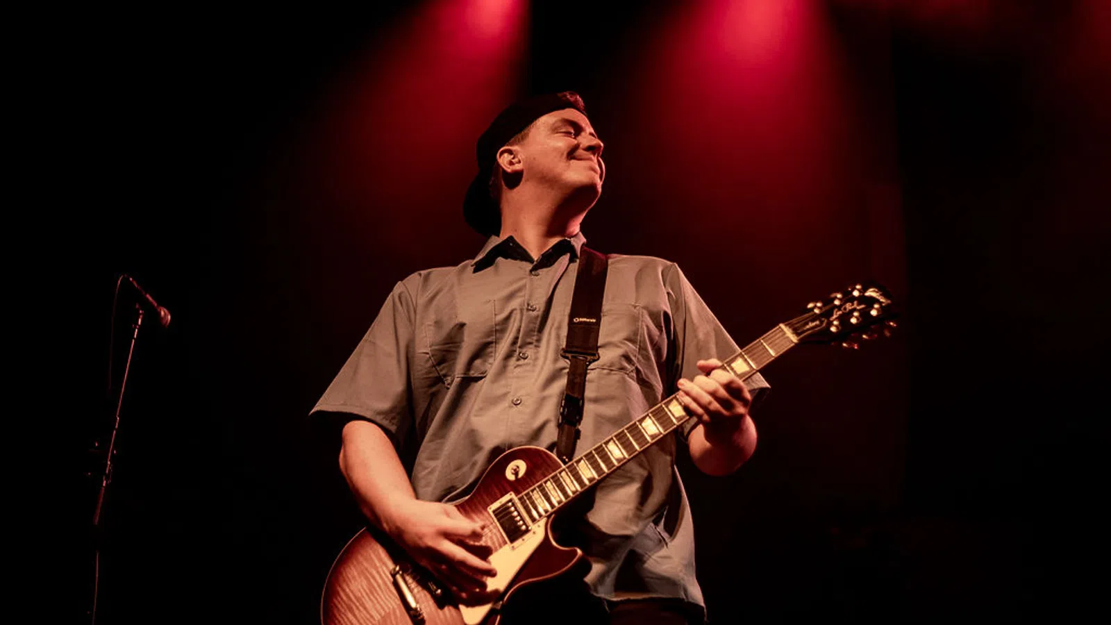 a man playing a guitar