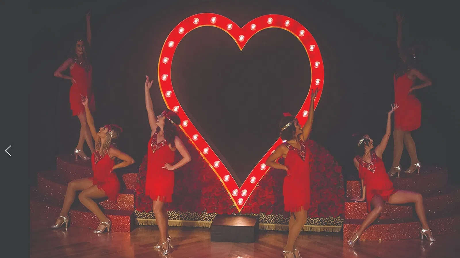 a group of women dancing on a stage