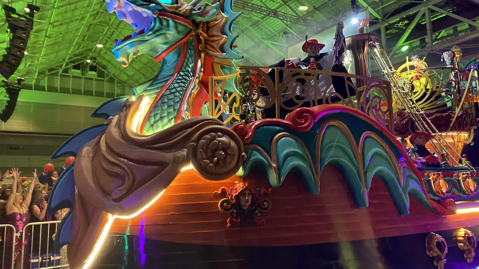 a colorful ride with people on it